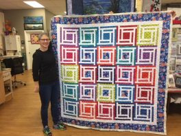 Diana Hewins and her winter quilt