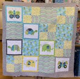 lisa-iverson-baby-quilt-in-blues-and-greens