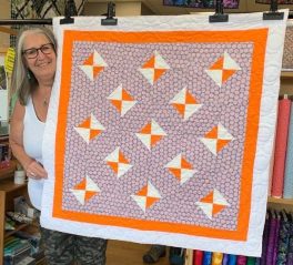 sher-perry-oranges-and-greys-quilt