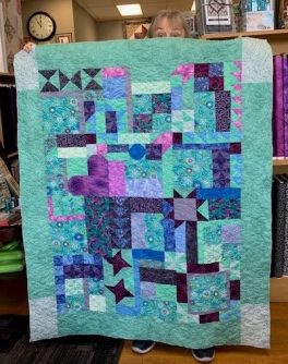 kathy-mirtle-puzzle-quilt-for-river-valley-guild