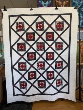 cheryl-sebastion-red-white-and-black-quilt-on-point-twin