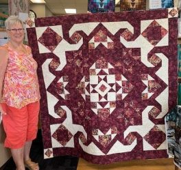 margaret-mitchell-guild-challenge-quilt-in-burgandy