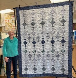 kathy-elliott-chandelier-quilt-in-blues-greys